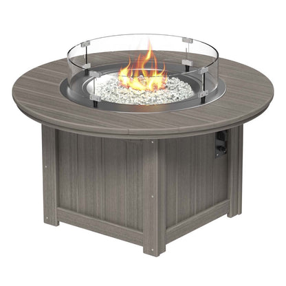 LuxCraft Costal Gray Lumin Fire Pit 46-inch Round surrounded by comfortable outdoor seating, perfect for backyard gatherings and warm, ambient nights.